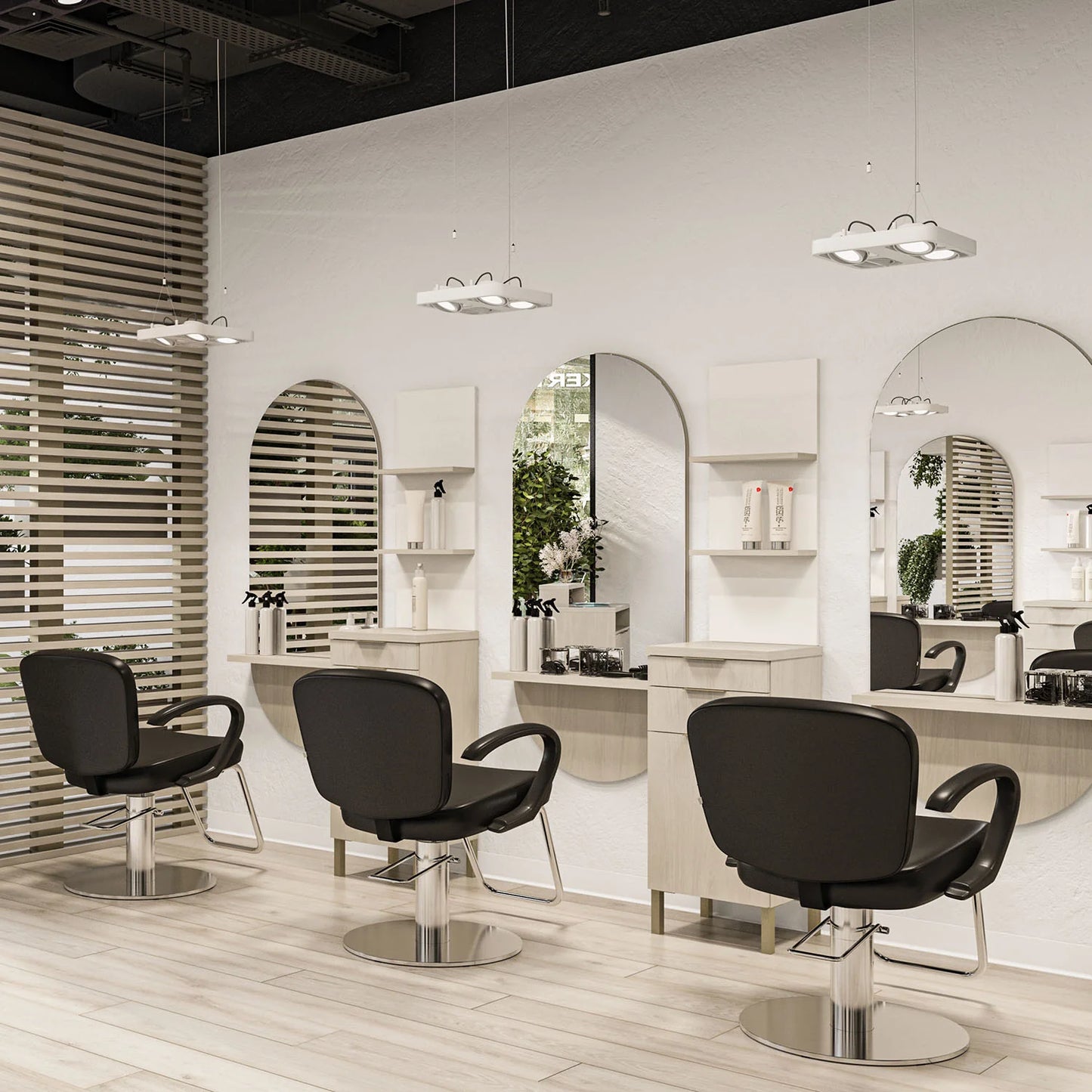 Collins Access Styling Chair with black cushioned upholstery and chrome hydraulic base, designed for comfort and modern salon use.