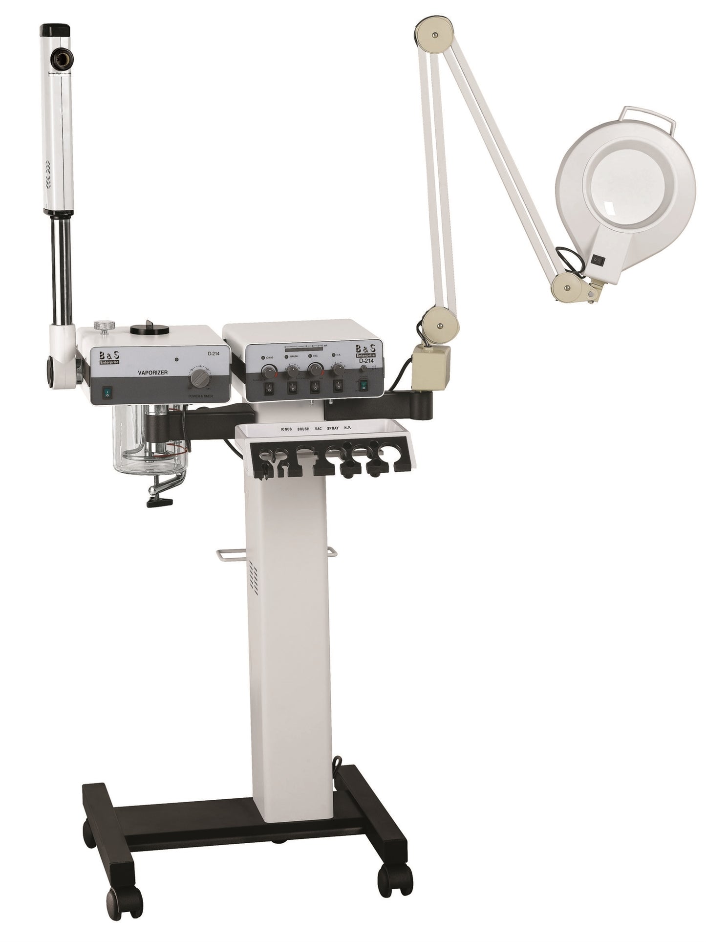 A multifunction facial machine with various attachments including a rotating brush system, a steam nozzle, and a magnifying lamp.
