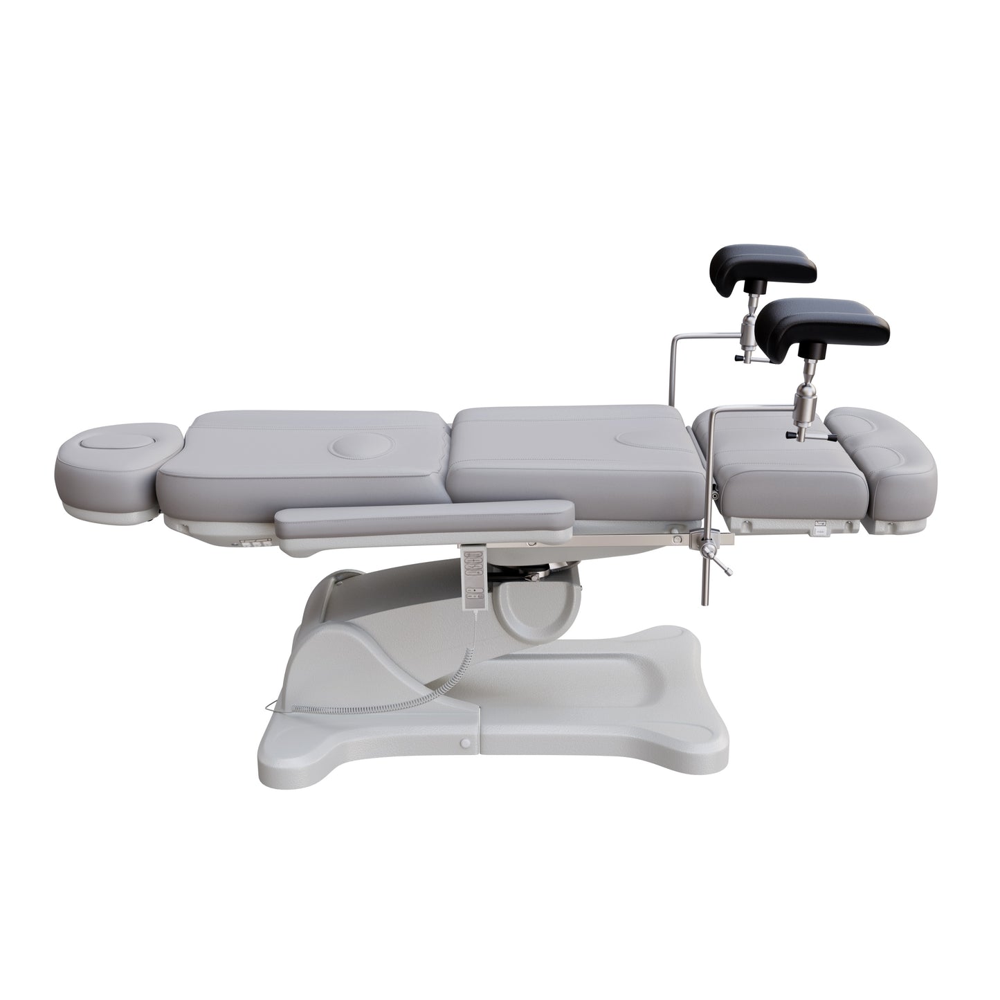Fully electric Spa Numa OB-GYN swivel treatment chair with removable stainless-steel stirrups, extendable headrest, 240-degree rotation, and PU vinyl upholstery.