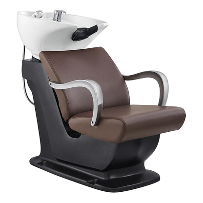 Brown hair washing chair with white basin on a white background