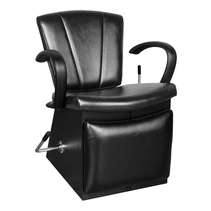 A black Sean Patrick shampoo chair with leg rest and manual controls, designed for use in professional salons.