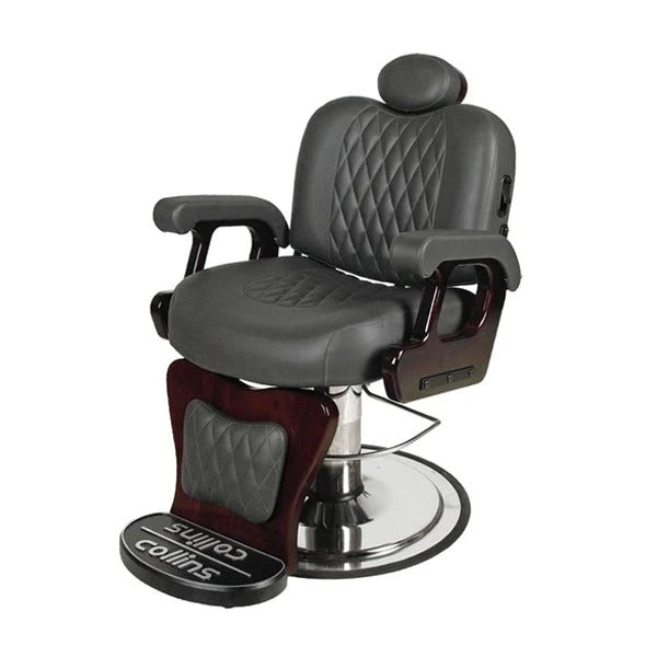 A Collins Commander I Barber Chair with a dark quilted upholstery, padded backrest, seat, and armrests, featuring a chrome finish base and footrest.