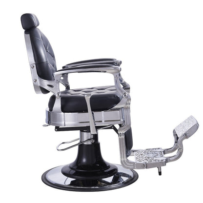 Vanquish barber chair with a bold, modern design, featuring a sturdy base and padded seating.