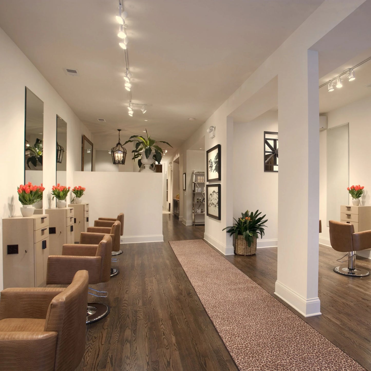 Salon interior with chairs, mirrors, and decor