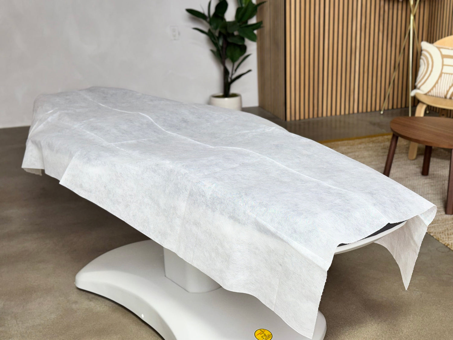 disposable bed sheet covering massage table full length professional spa setup