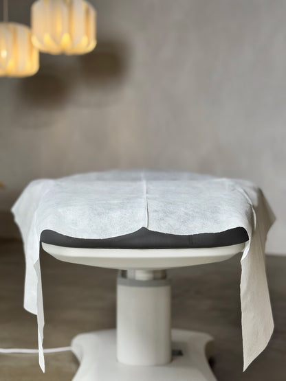 disposable bed sheet covering massage table full length professional spa setup