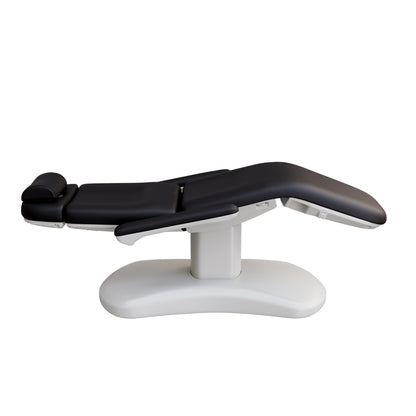 Spa Numa LUCENT 4 motor electric treatment chair with pedestal column base, vegan leather upholstery, Trendelenburg position, and adjustable armrests—ideal for facials, medspa services, and luxury salon treatments in compact spaces.