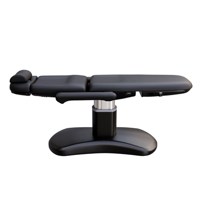 Spa Numa LUCENT 4 motor electric treatment chair with black pedestal base, vegan leather upholstery, Trendelenburg position, and adjustable armrests—perfect for luxury spas, facial treatments, and compact medspa rooms.