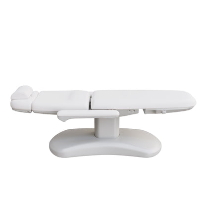 Spa Numa LUCENT 4 motor luxury electric treatment chair in vegan leather with pedestal base, reversible armrests, extendable headrest, and Trendelenburg position—ideal for high-end spa, salon, and aesthetic treatment procedures in compact spaces.