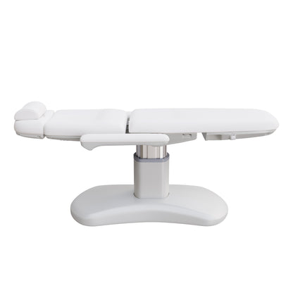 Spa Numa LUCENT 4 motor luxury electric treatment chair in vegan leather with pedestal base, reversible armrests, extendable headrest, and Trendelenburg position—ideal for high-end spa, salon, and aesthetic treatment procedures in compact spaces.