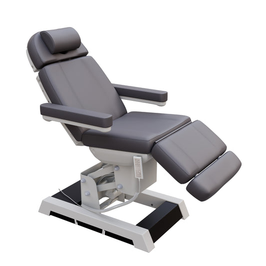 Spa Numa MILANO 4 motor medical-grade electric pedestal chair with built-in foot pedals – adjustable height, backrest, footrest, and tilt with removable armrests, vinyl upholstery, and reset function for clinical, spa, and wellness treatments.