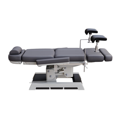 Fully electric Spa Numa MILANO OB-GYN chair with stirrups – 4 motor medical-grade treatment chair with adjustable height, tilt, backrest, and footrest, built-in foot pedals, and easy-to-clean vinyl for outpatient procedures.