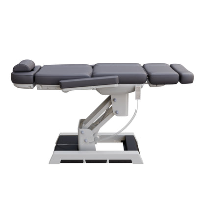 Spa Numa MILANO 4 motor medical-grade electric pedestal chair with built-in foot pedals – adjustable height, backrest, footrest, and tilt with removable armrests, vinyl upholstery, and reset function for clinical, spa, and wellness treatments.