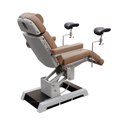 Medical-grade Spa Numa MILANO OB-GYN treatment chair with electric height, tilt, footrest, and backrest adjustment – includes stirrups, side foot controls, and cushioned support for outpatient procedures.