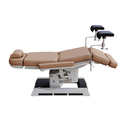 Medical-grade Spa Numa MILANO OB-GYN treatment chair with electric height, tilt, footrest, and backrest adjustment – includes stirrups, side foot controls, and cushioned support for outpatient procedures.