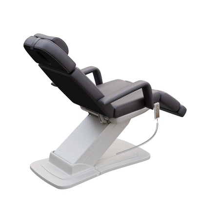 Spa Numa MINO luxury three motor electric treatment chair in white – adjustable height, backrest, and tilt with removable arms and face hole – ideal for medical, spa, and aesthetic procedures.