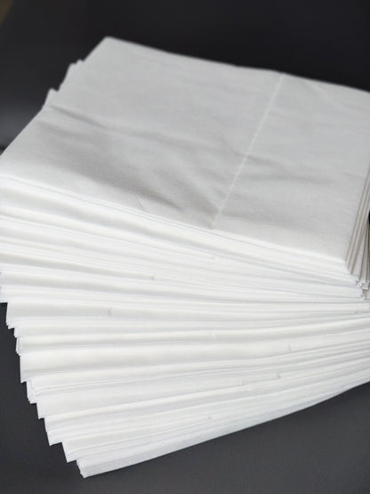 pre cut disposable bed sheets folded stack non woven spa supplies ready to use