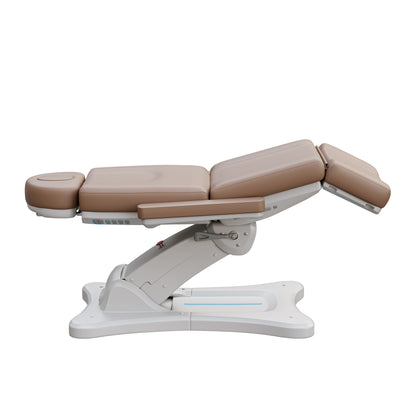 Spa Numa SERENITY 4 motor electric treatment chair with adjustable height, tilt, leg rest, LED controls, and 240-degree rotation for medical and esthetic procedures