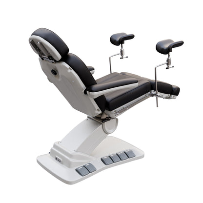 Adjustable OB-GYN medical exam chair with stirrups, vegan leather upholstery, foot pedals, and memory controls for outpatient procedures.
