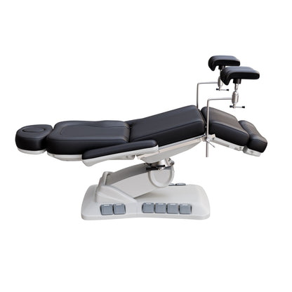 Adjustable OB-GYN medical exam chair with stirrups, vegan leather upholstery, foot pedals, and memory controls for outpatient procedures.