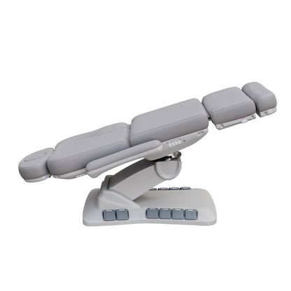 SPA NUMA Swivel Deluxe 4 Motor Electric Treatment Chair for esthetic procedures, outpatient surgery, and medical evaluations – features 120° rotation, vegan leather upholstery, built-in foot pedals, reversible armrests, extendable headrest with face hole.