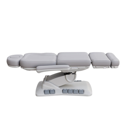 SPA NUMA Swivel Deluxe 4 Motor Electric Treatment Chair for esthetic procedures, outpatient surgery, and medical evaluations – features 120° rotation, vegan leather upholstery, built-in foot pedals, reversible armrests, extendable headrest with face hole.
