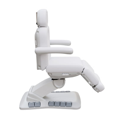 Spa Numa SWIVEL DELUXE 4 motor electric treatment chair with 120° rotation, built-in foot pedals, extendable headrest with facial hole, and vegan leather upholstery—ideal for esthetic procedures, outpatient surgery, and medspa treatments.