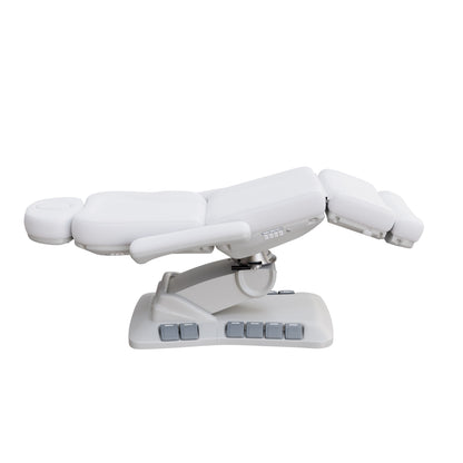 Spa Numa SWIVEL DELUXE 4 motor electric treatment chair with 120° rotation, built-in foot pedals, extendable headrest with facial hole, and vegan leather upholstery—ideal for esthetic procedures, outpatient surgery, and medspa treatments.