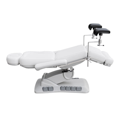Spa Numa OB-GYN Swivel Deluxe 4-motor electric treatment chair with stirrups, 120° rotation, vegan leather upholstery, and memory remote for gynecology and aesthetic procedures.