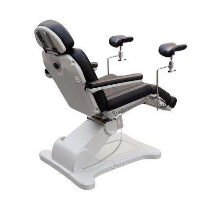 Fully electric Spa Numa OB-GYN treatment table with 4 motors, 240° rotation, adjustable PU leather headrest, and stainless-steel stirrups for clinical and aesthetic procedures.
