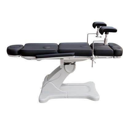 Fully electric Spa Numa OB-GYN treatment table with 4 motors, 240° rotation, adjustable PU leather headrest, and stainless-steel stirrups for clinical and aesthetic procedures.