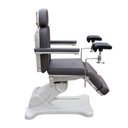Spa Numa fully electric OB-GYN treatment chair with 240° swivel, surgical-grade stainless steel stirrups, adjustable backrest and leg rest, removable armrests, and PU leather upholstery for medical and esthetic use.