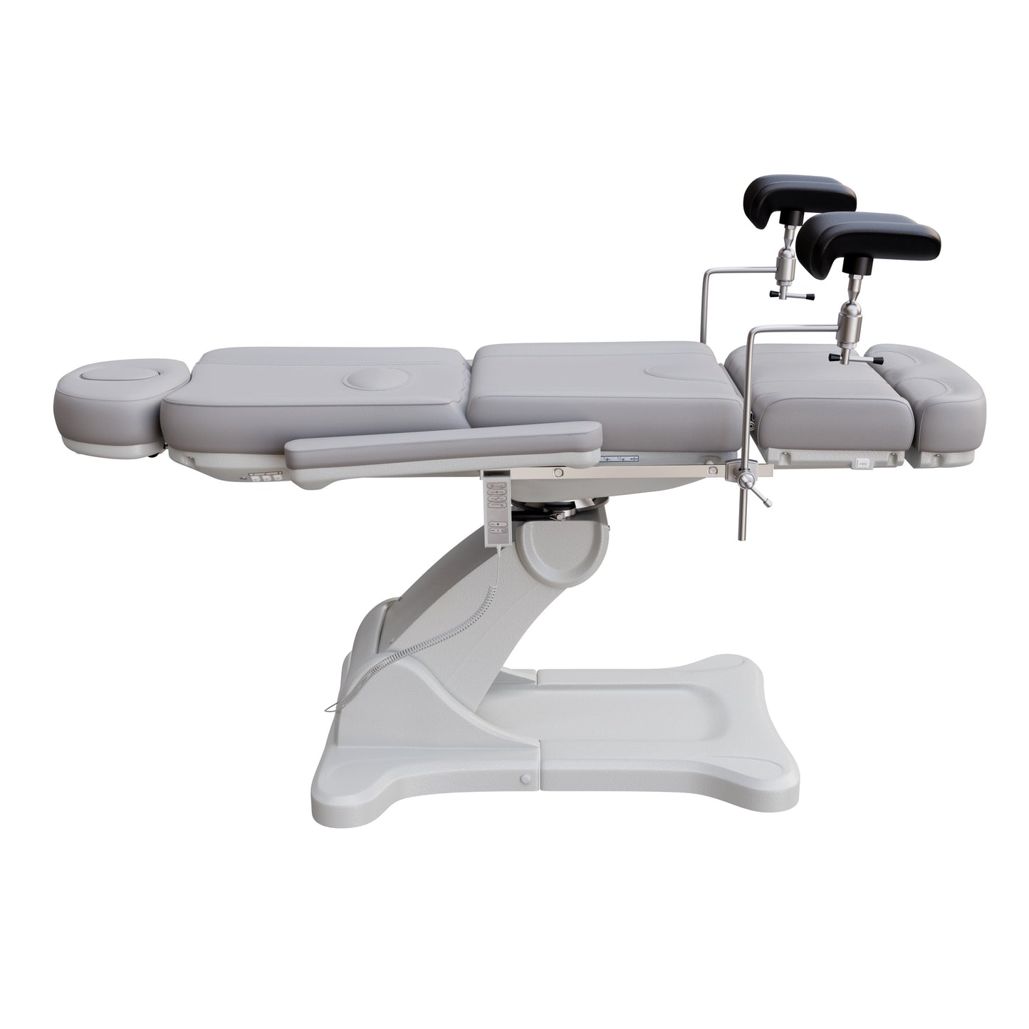 Fully electric Spa Numa OB-GYN swivel treatment chair with removable stainless-steel stirrups, extendable headrest, 240-degree rotation, and PU vinyl upholstery.