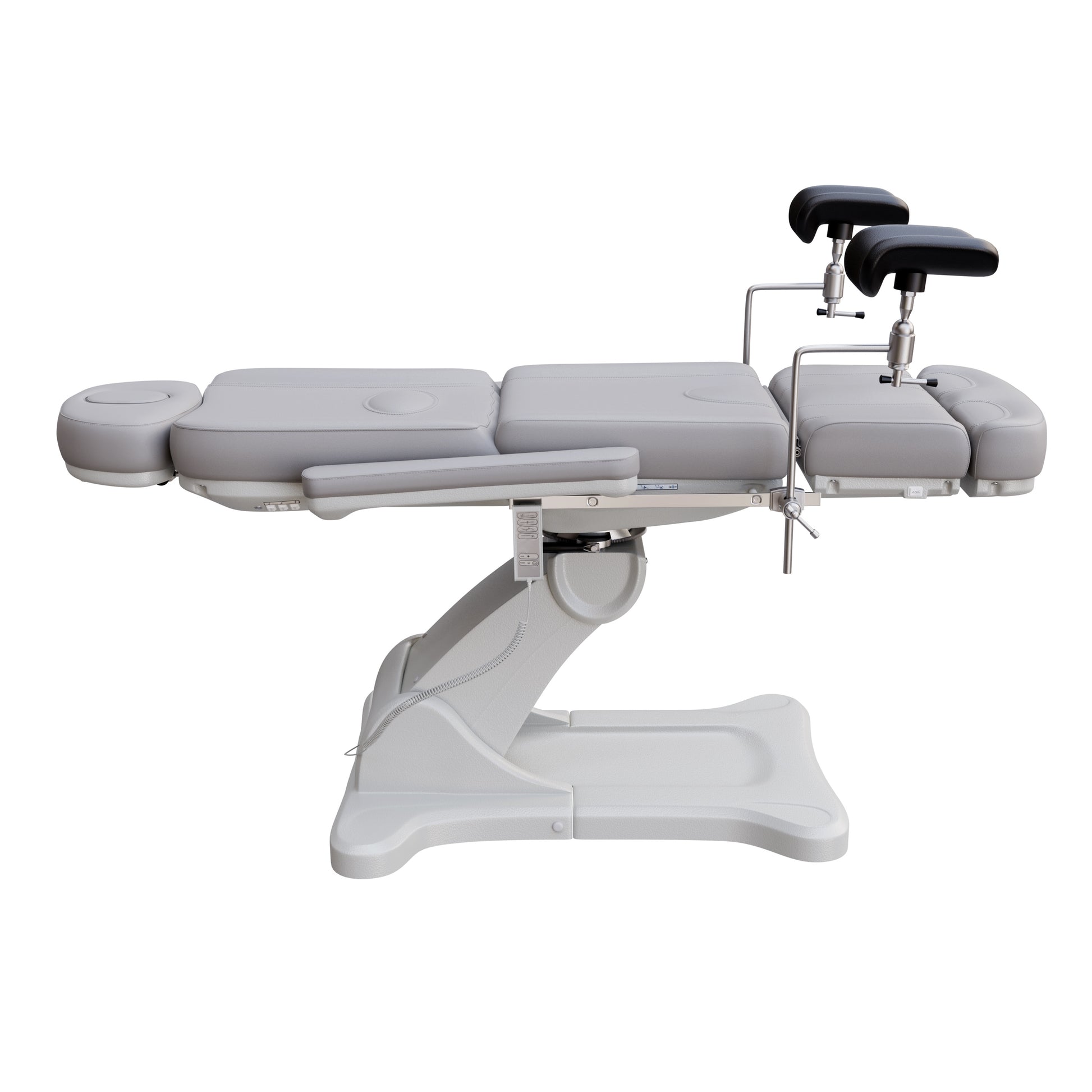 Fully electric Spa Numa OB-GYN swivel treatment chair with removable stainless-steel stirrups, extendable headrest, 240-degree rotation, and PU vinyl upholstery.