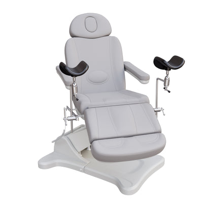 Fully electric Spa Numa OB-GYN swivel treatment chair with removable stainless-steel stirrups, extendable headrest, 240-degree rotation, and PU vinyl upholstery.