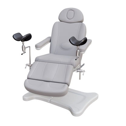 Fully electric Spa Numa OB-GYN swivel treatment chair with removable stainless-steel stirrups, extendable headrest, 240-degree rotation, and PU vinyl upholstery.