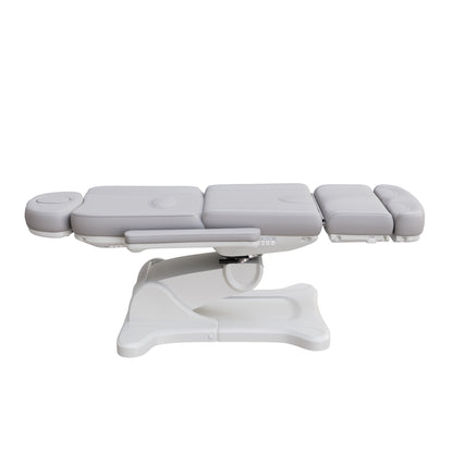 Spa Numa SWIVEL fully electric treatment chair with 4-motor adjustment, 240-degree rotation, vegan leather upholstery, and extendable headrest for medical and esthetic procedures.