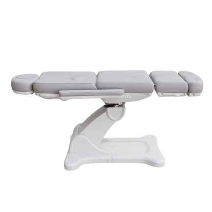 Spa Numa SWIVEL fully electric treatment chair with 4-motor adjustment, 240-degree rotation, vegan leather upholstery, and extendable headrest for medical and esthetic procedures.