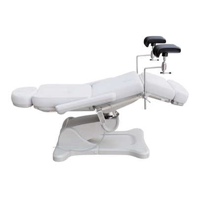 Fully electric OB-GYN exam and procedure table by Spa Numa with 240° swivel rotation, removable stirrups, adjustable headrest, and PU vinyl upholstery.