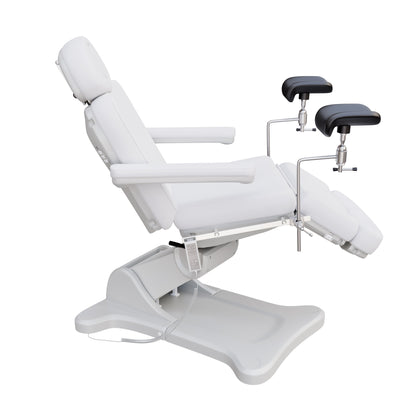 Fully electric OB-GYN exam and procedure table by Spa Numa with 240° swivel rotation, removable stirrups, adjustable headrest, and PU vinyl upholstery.