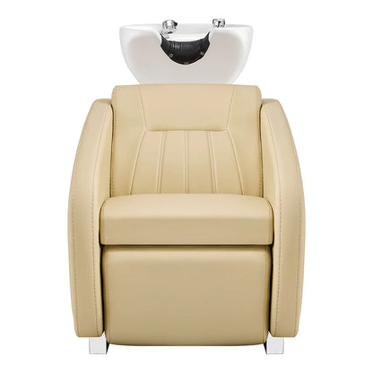 Beige salon chair with a white basin on a white background