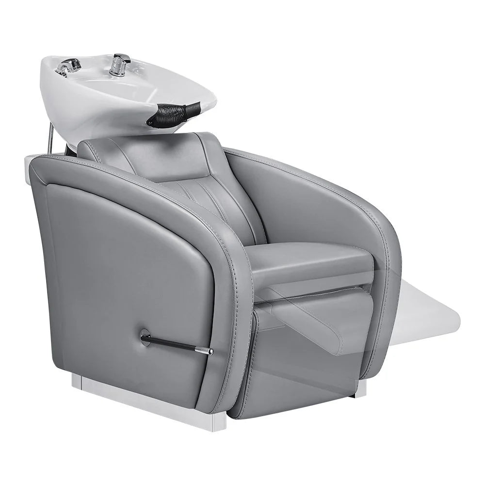 Gray salon chair with a white basin on a white background