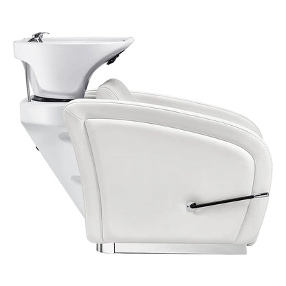 White salon chair with built-in sink on a white background