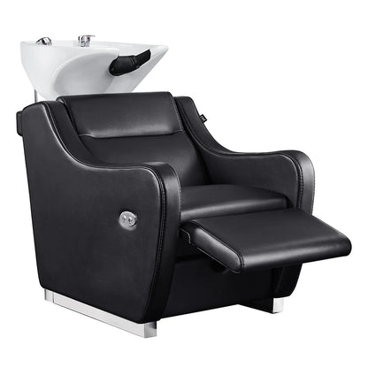Black salon chair with a white shampoo bowl on a white background