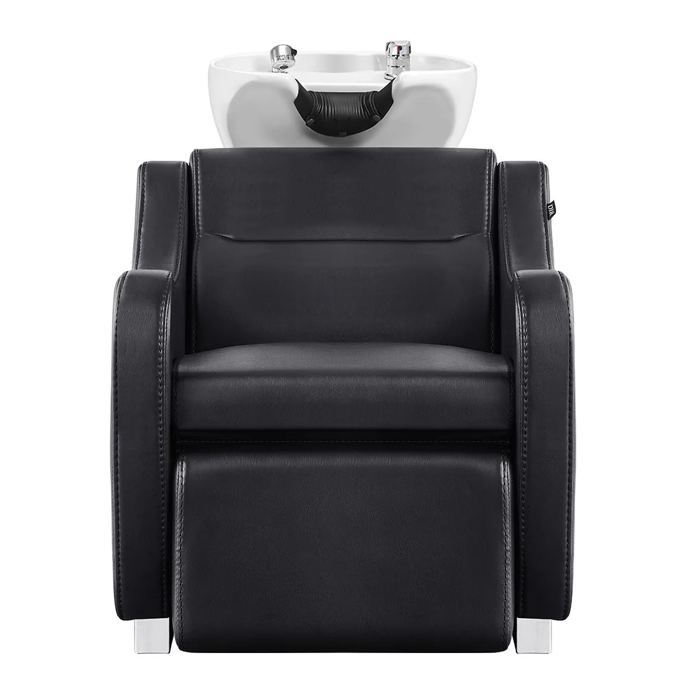 Black salon chair with white basin on a white background