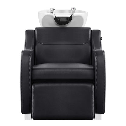 Black salon chair with white basin on a white background