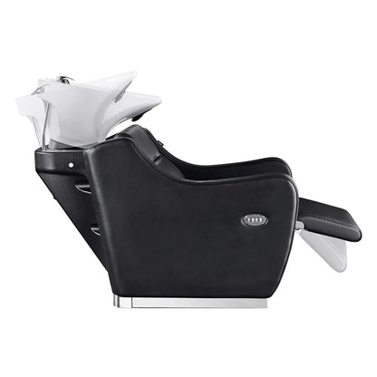 Black hair washing chair with white basin on a white background
