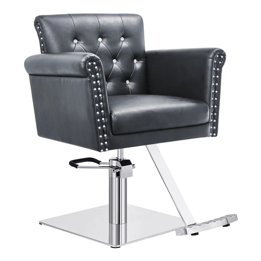 Gray salon chair with studded details on a white background