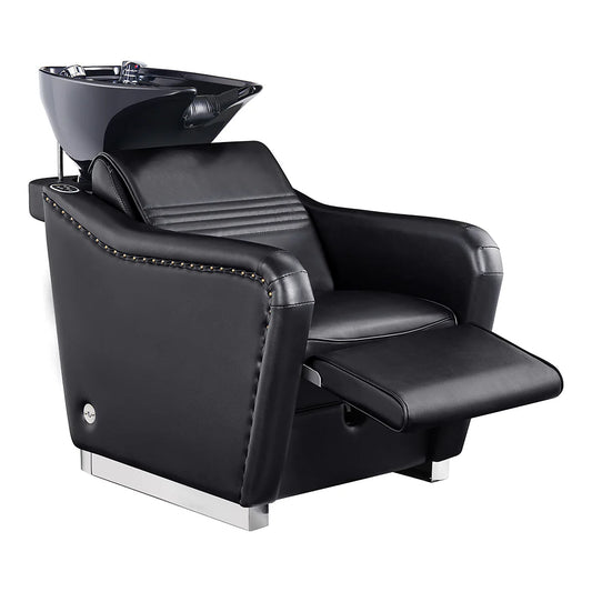Black salon chair with built-in shampoo bowl on a white background
