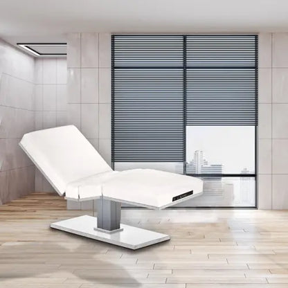 Living Earth Crafts Pedestal Manual Tilt Electric Lift Table in luxury spa setting